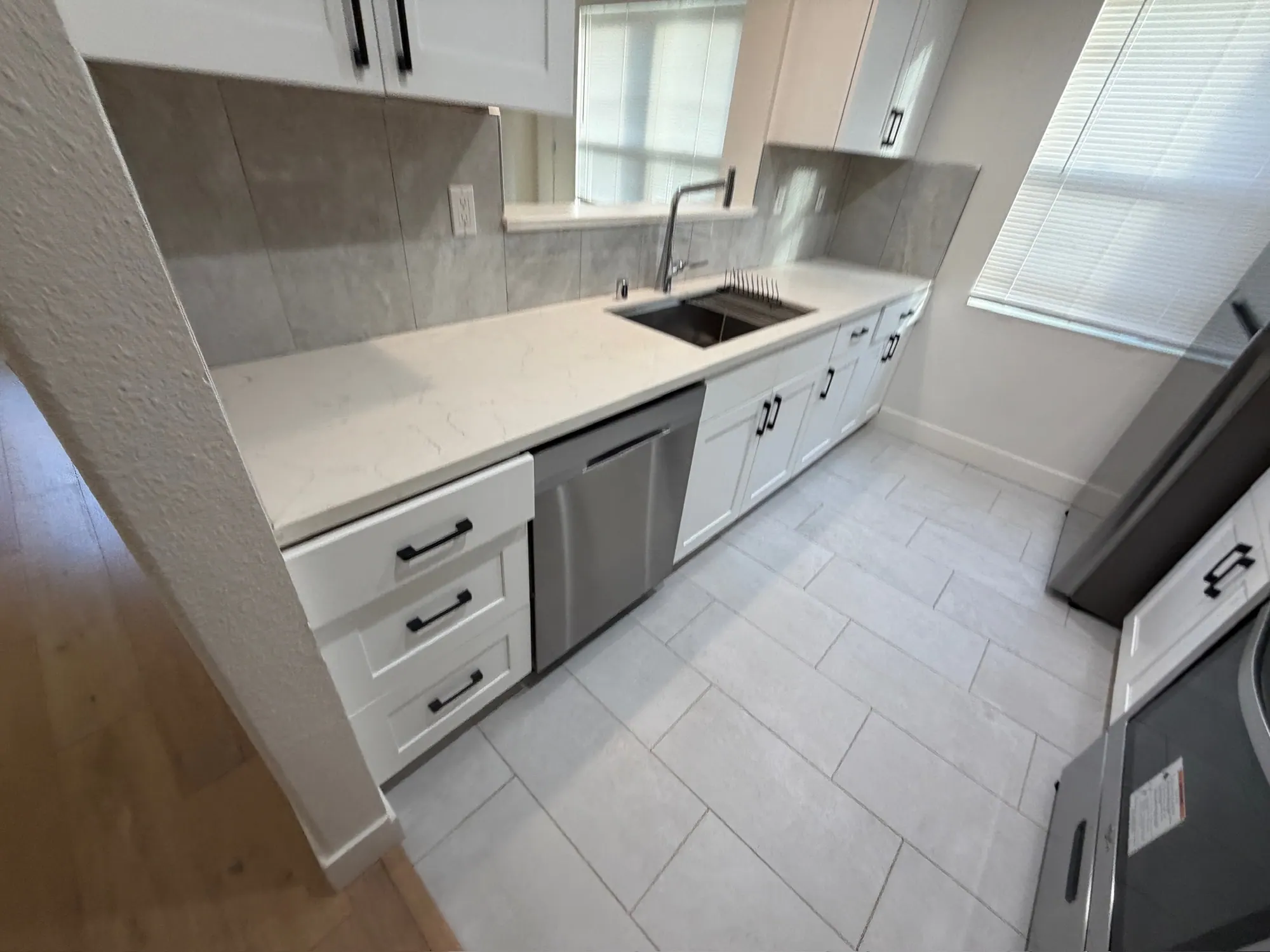 Kitchen counter run with an undermount sink and stainless dishwasher