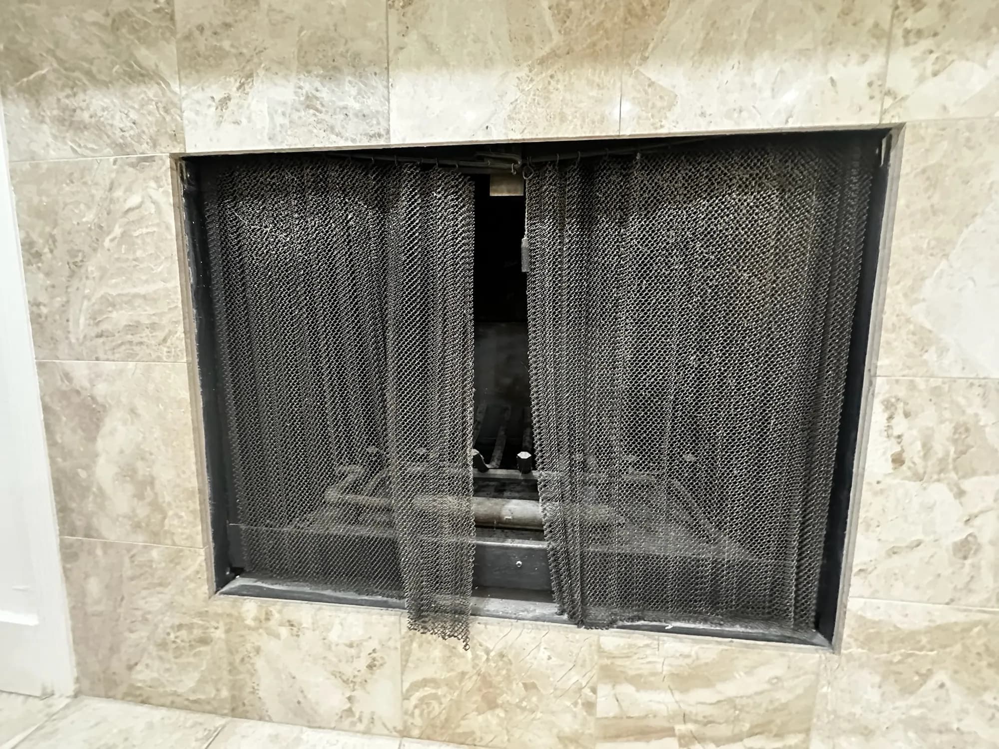 Fireplace with a new travertine surround