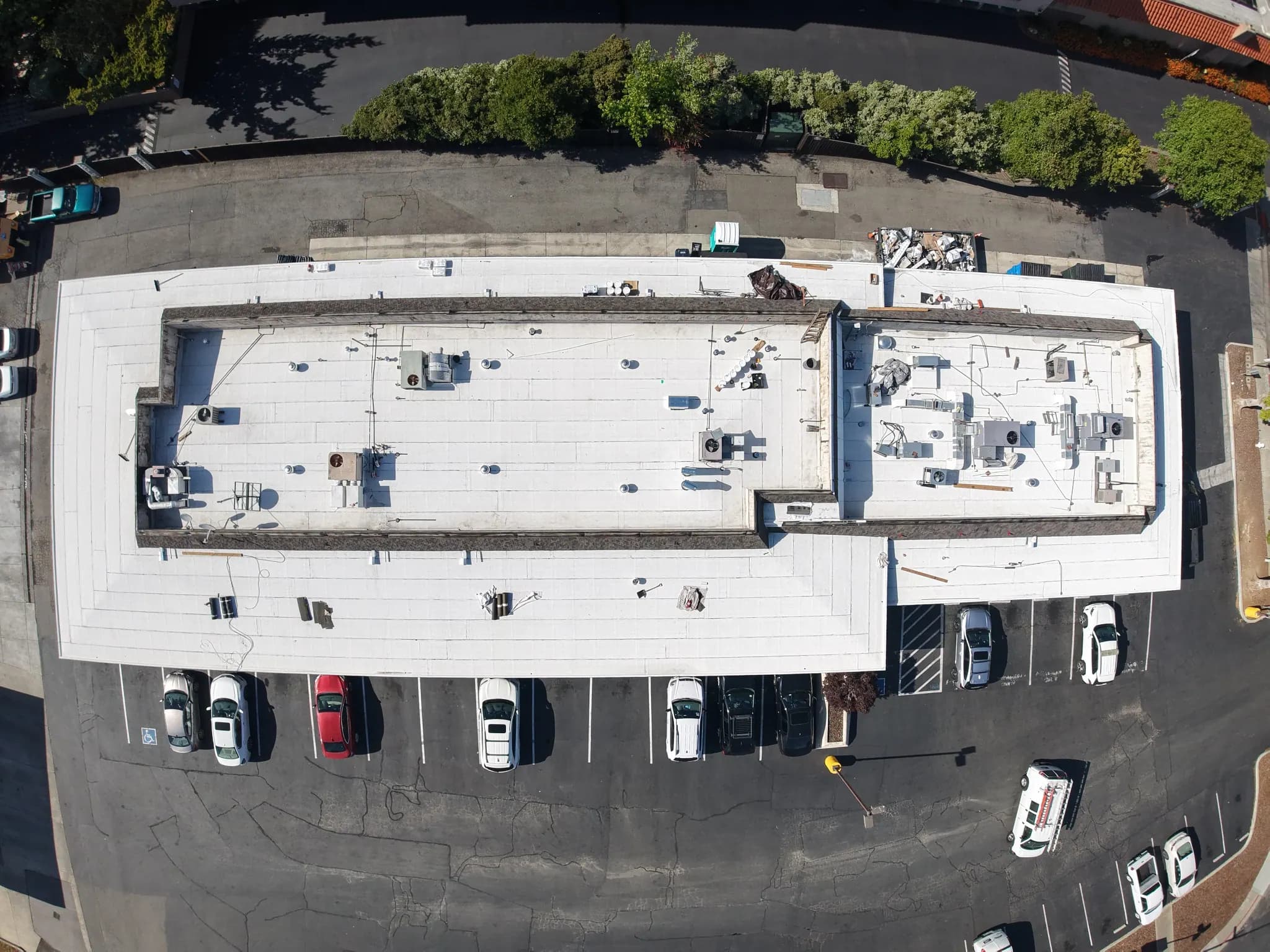 Plan view of the center’s two roof sections, rooftop units and front parking